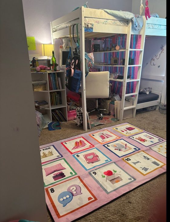 An early TidyKids family's bedroom with the TidyMat on the floor